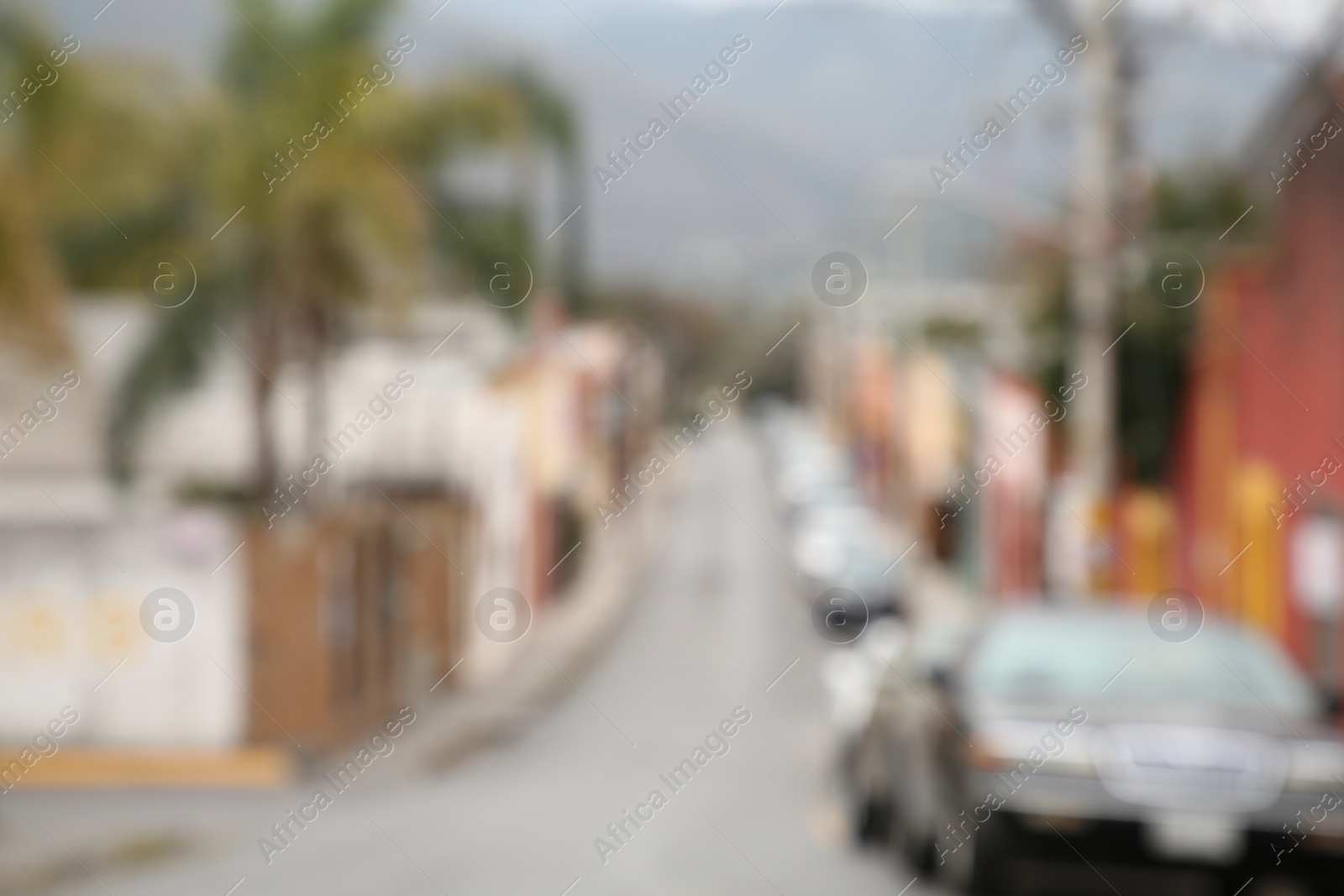 Photo of San Pedro Garza Garcia, Mexico – February 8, 2023: Blurred view of street with cars and beautiful buildings