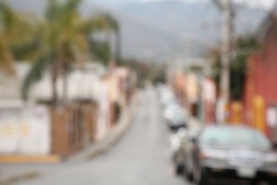 San Pedro Garza Garcia, Mexico – February 8, 2023: Blurred view of street with cars and beautiful buildings