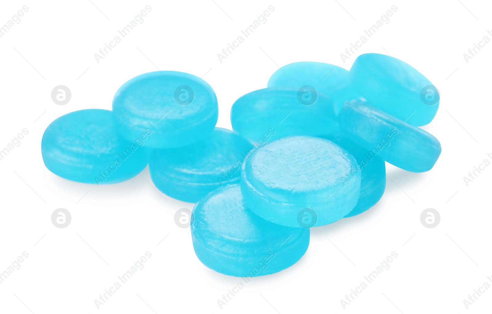 Photo of Many light blue cough drops on white background