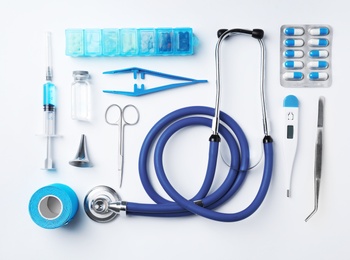 Photo of Flat lay composition with medical objects on white background