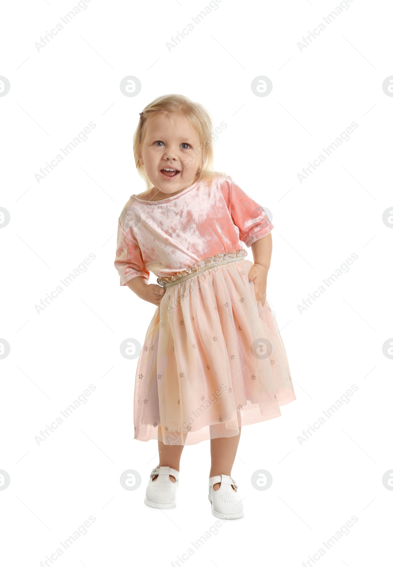 Photo of Cute little girl posing on white background