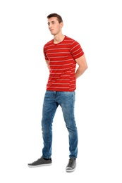 Photo of Full length portrait of young man in stylish clothes on white background