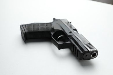 Photo of Semi-automatic pistol on white background. Standard handgun