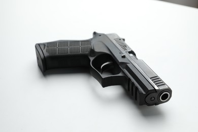 Semi-automatic pistol on white background. Standard handgun