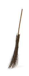 Photo of Old broom with wooden handle isolated on white