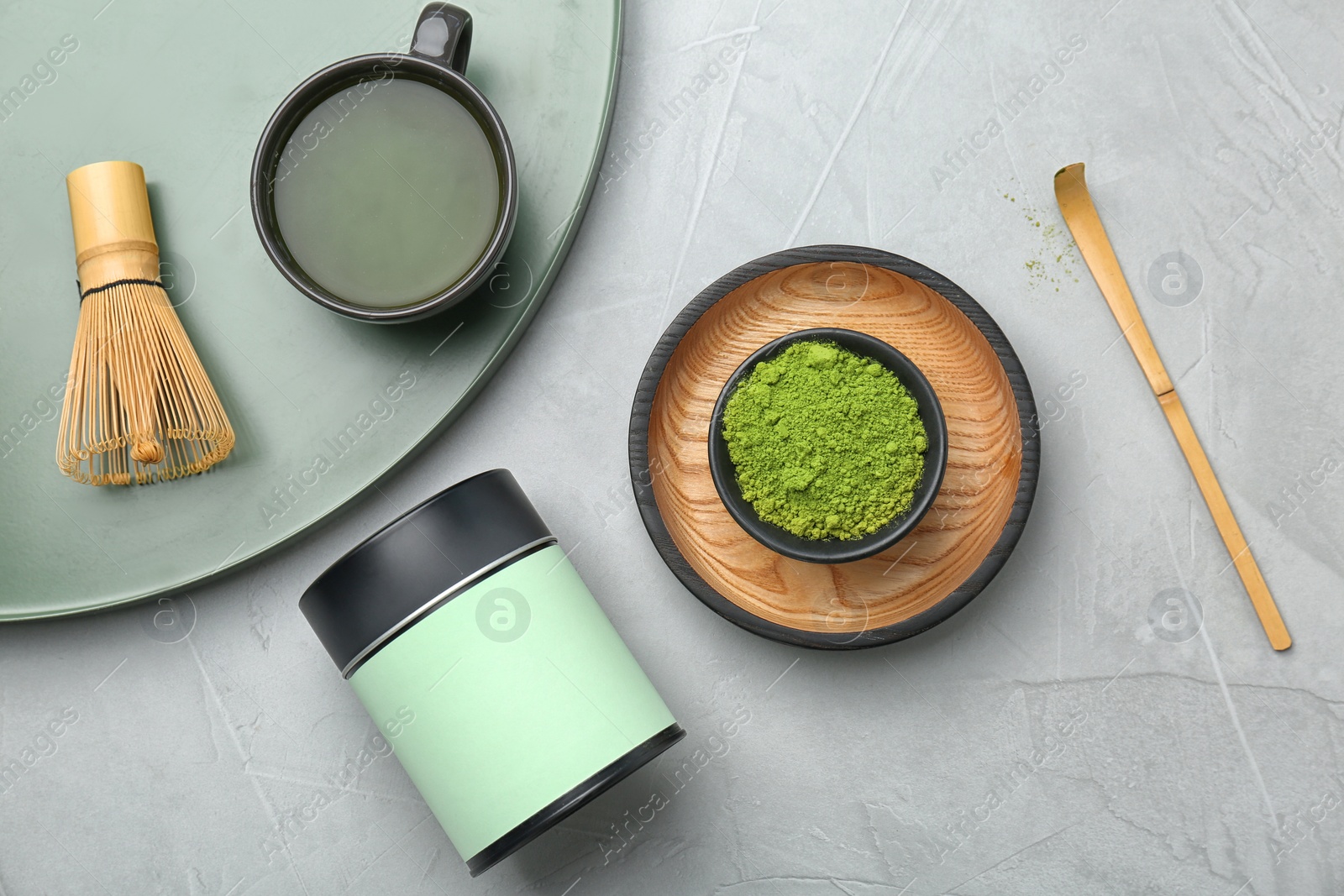 Photo of Flat lay composition with matcha tea on table