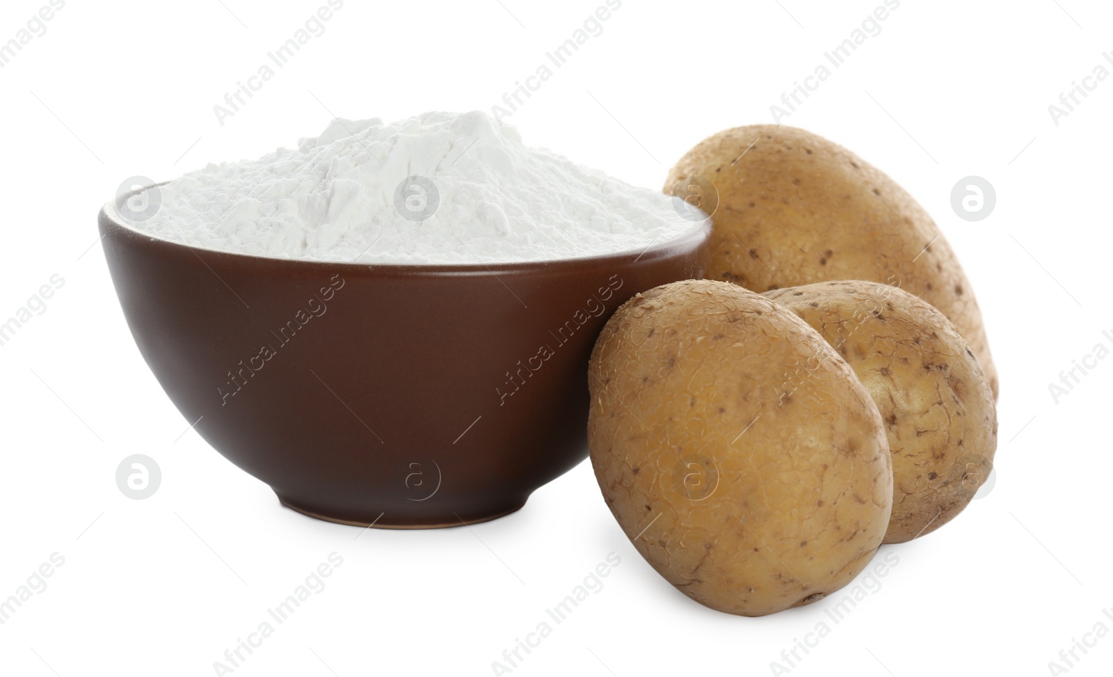 Photo of Bowl with starch and fresh potatoes on white background