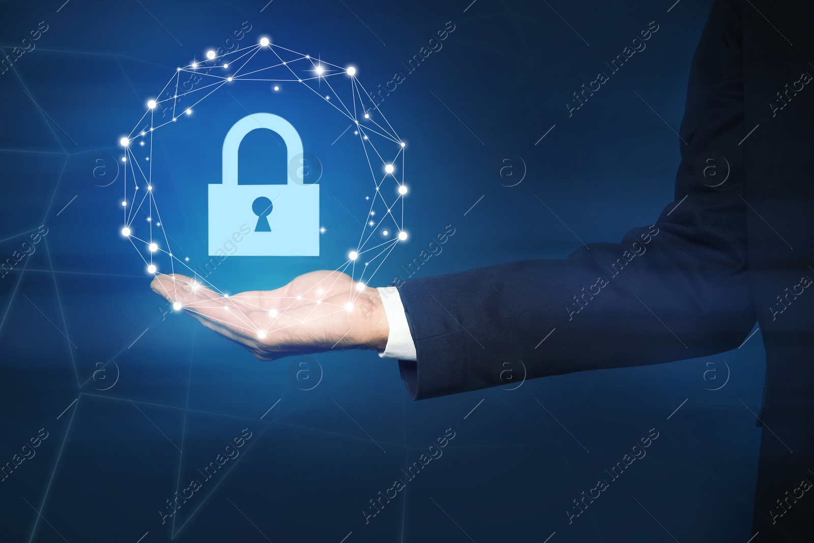 Image of Cyber security concept. Man holding virtual icon of padlock on dark background, closeup