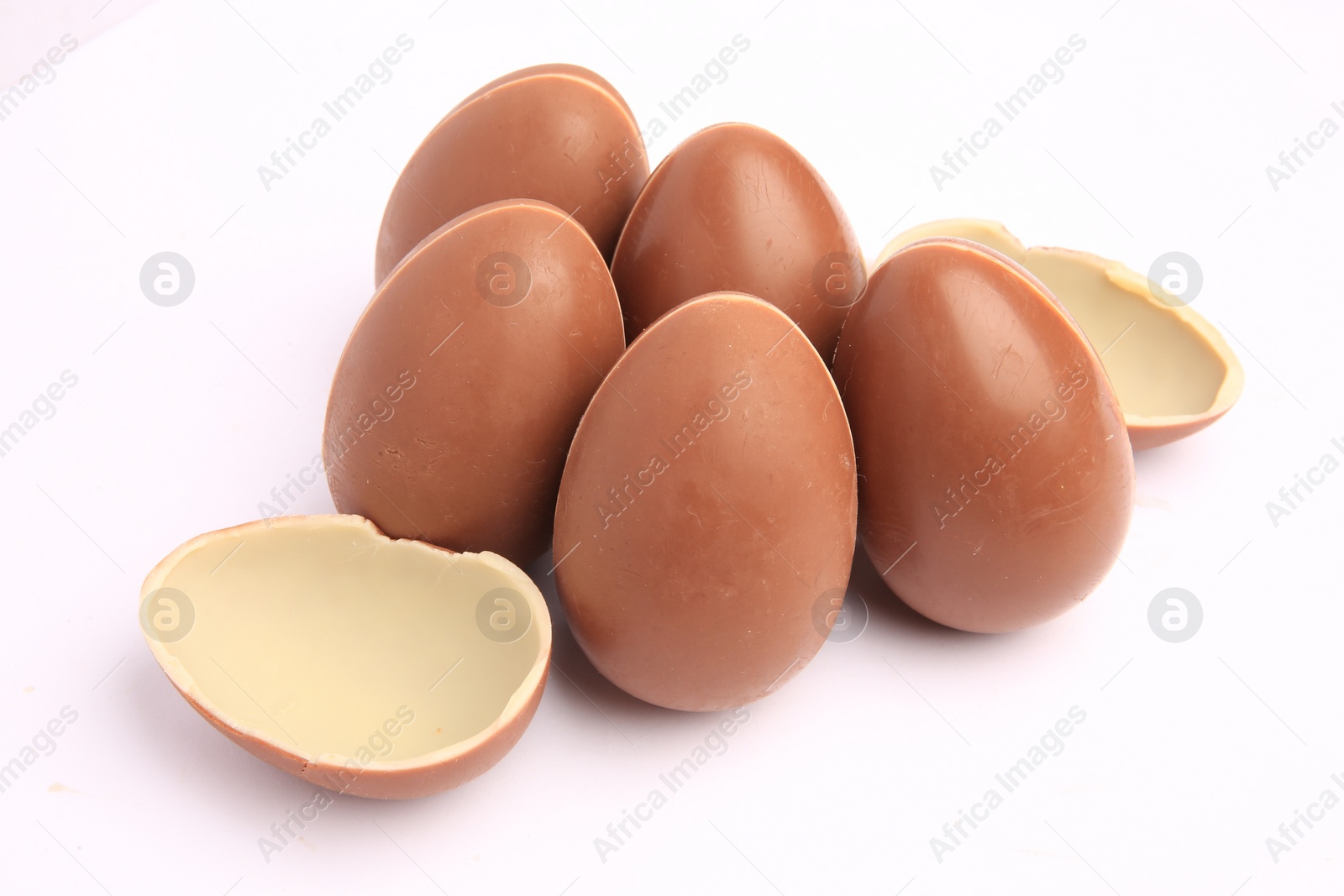 Photo of Sveti Vlas, Bulgaria - June 27, 2023: Unwrapped Kinder Surprise Eggs isolated on white