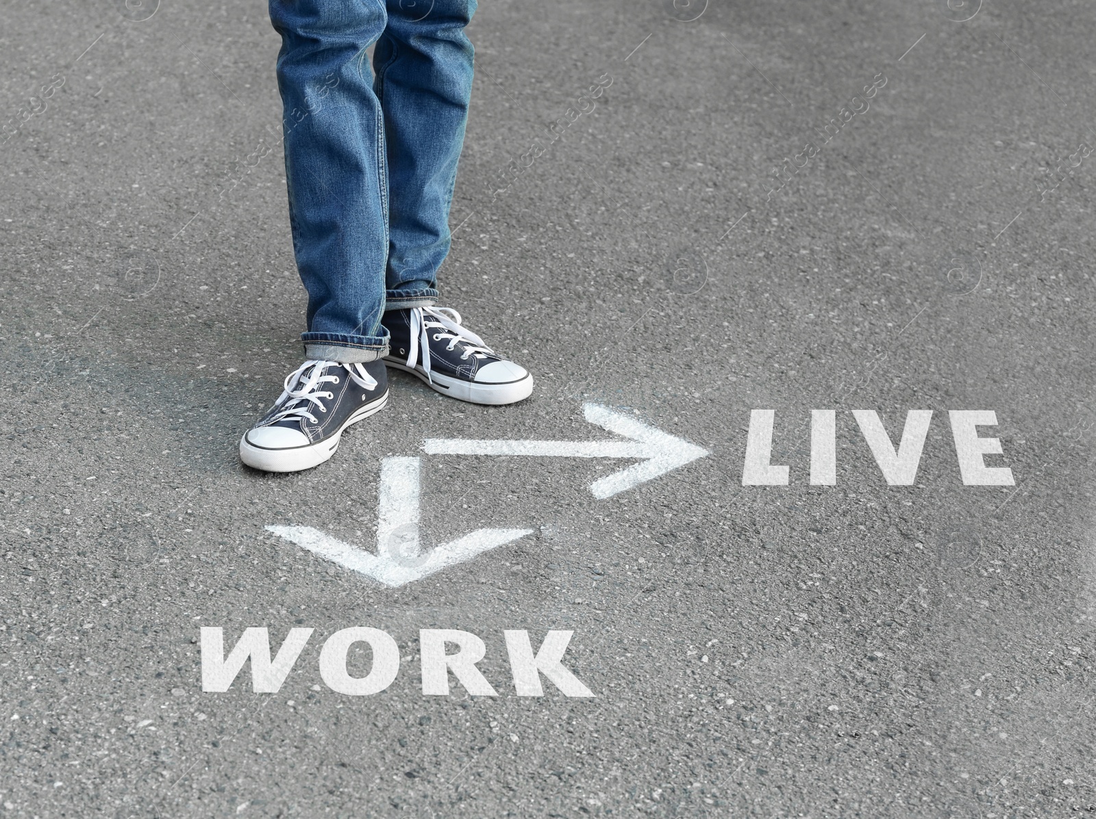 Image of Woman standing near arrows on asphalt, closeup. Concept of balance between life and work 