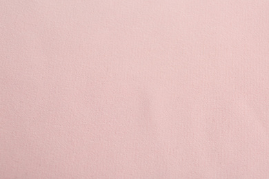 Photo of Texture of beautiful pink fabric as background, closeup