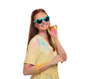 Photo of Woman covered with colorful powder dyes on white background. Holi festival celebration