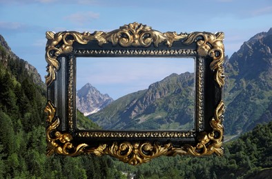 Image of Vintage frame and beautiful mountains under blue sky