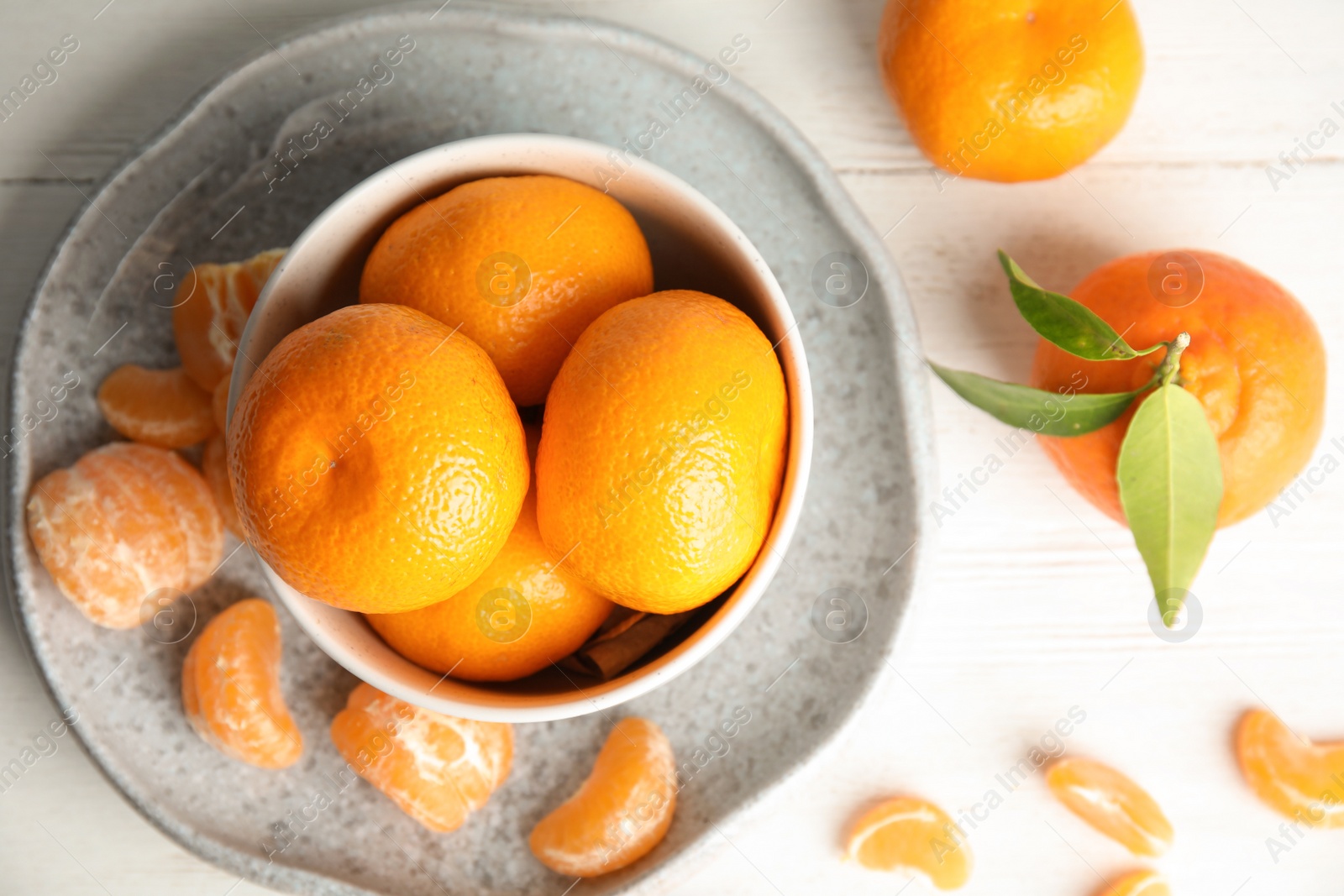 Photo of Flat lay composition with ripe tangerines on white wooden background