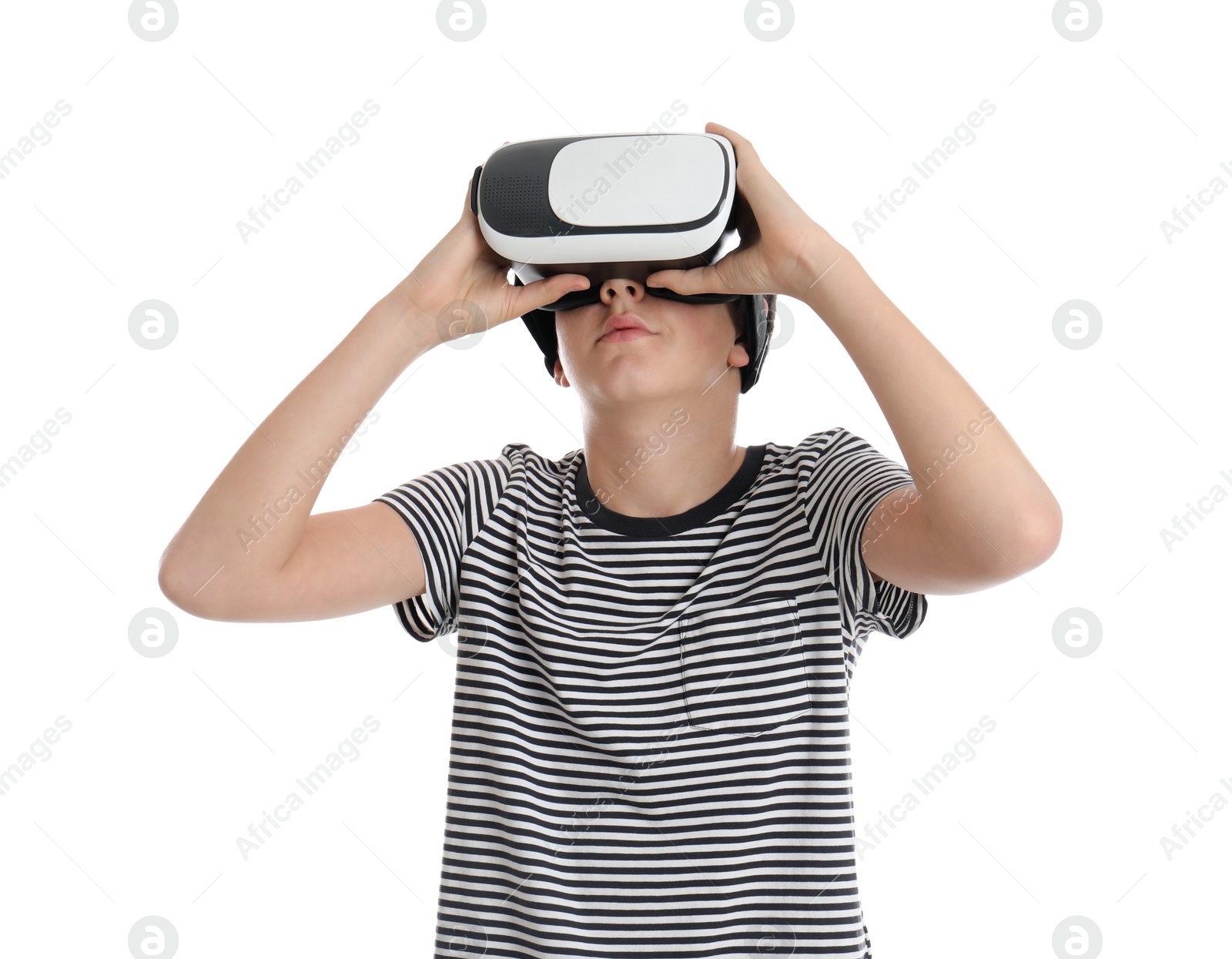 Photo of Teenage boy using virtual reality headset on white background