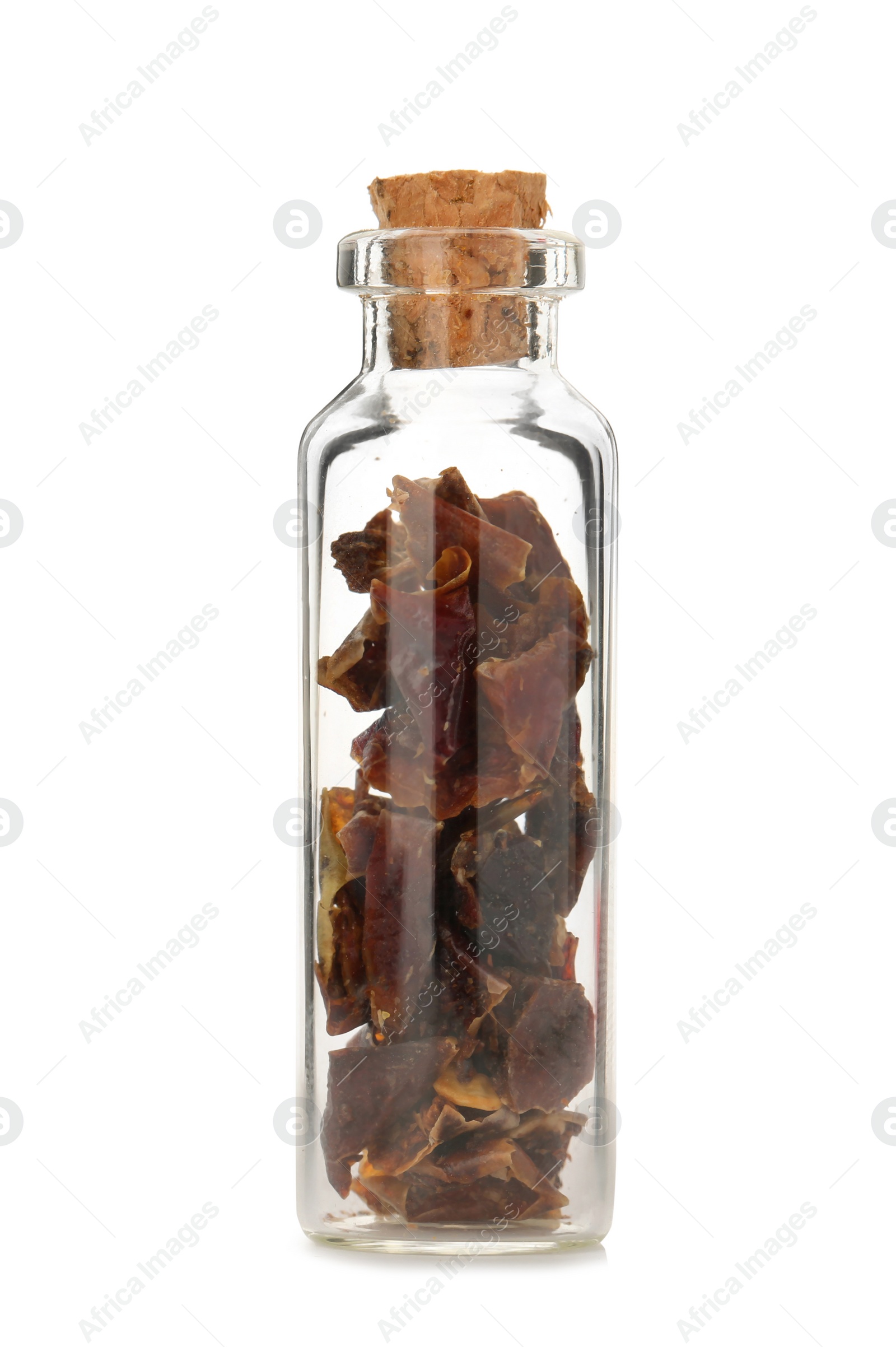 Photo of Glass bottle with spice on white background