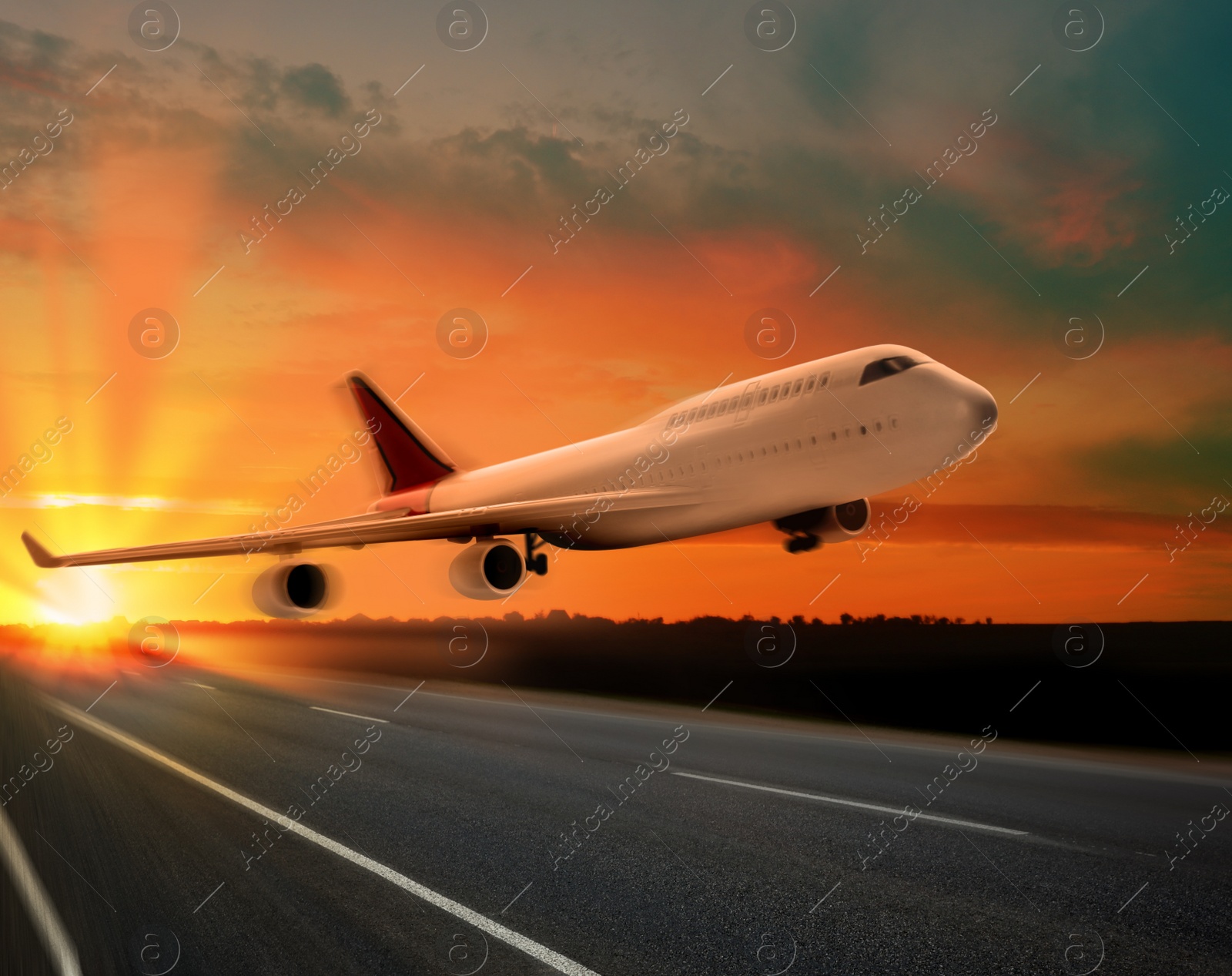 Image of Modern white airplane landing on runway 