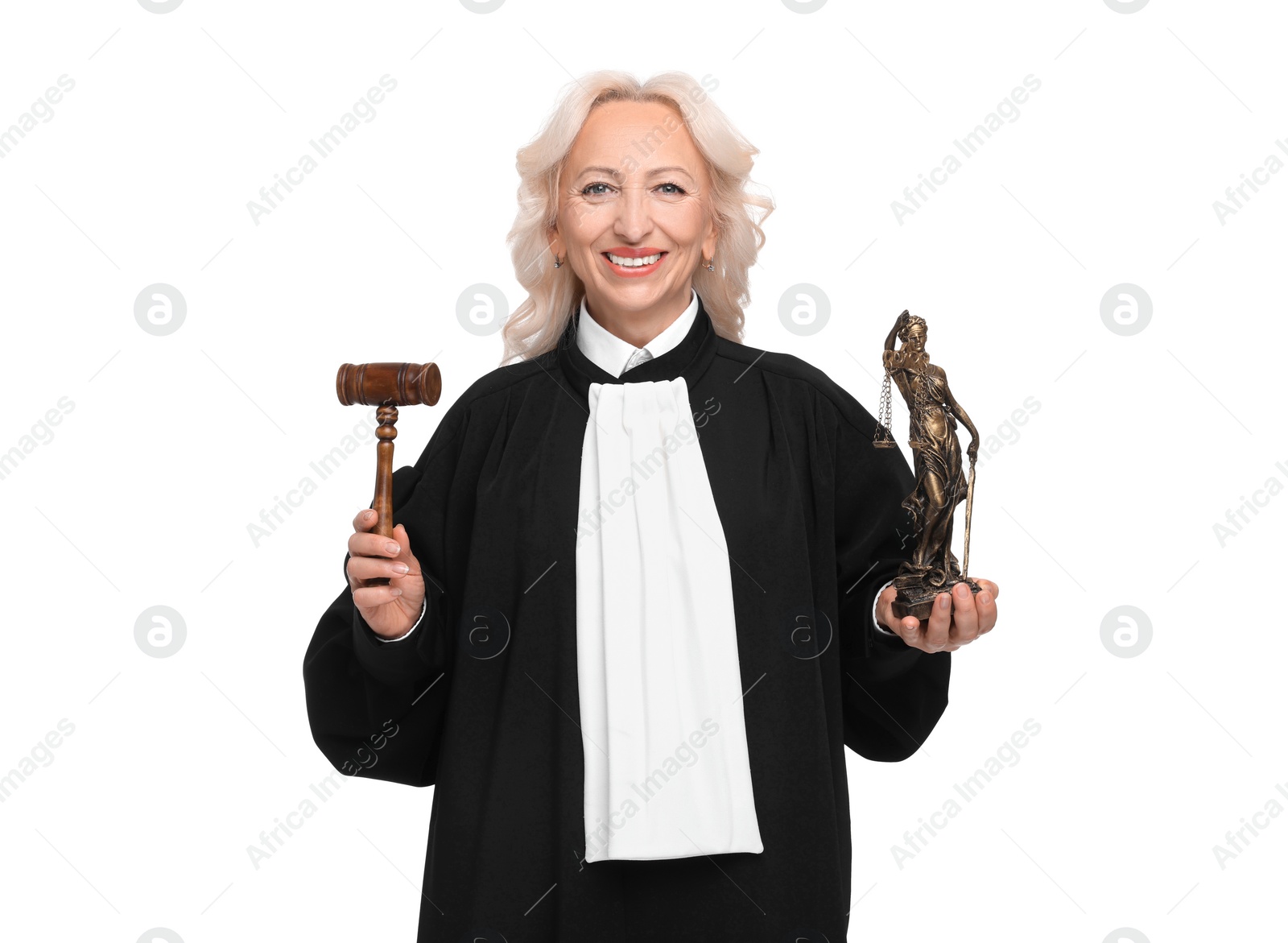 Photo of Smiling senior judge with gavel and figure of Lady Justice on white background