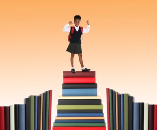 Image of Happy schoolgirl on stack of books against orange background. Way to knowledge