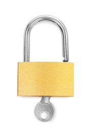 Photo of Steel padlock and key isolated on white, top view