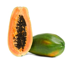 Fresh juicy ripe papayas on white background