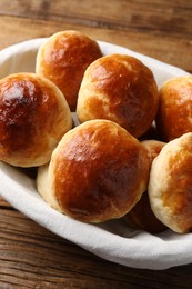 Tasty scones prepared on soda water on wooden table