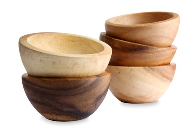 Set of wooden bowls on white background