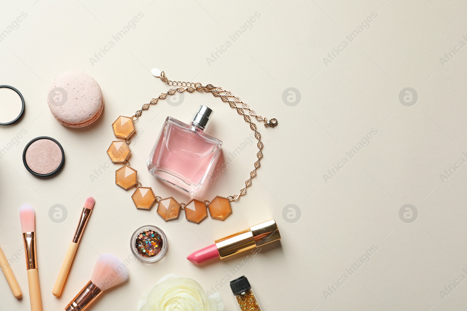 Photo of Flat lay composition with decorative cosmetics on color background