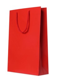 Photo of Red gift paper bag on white background