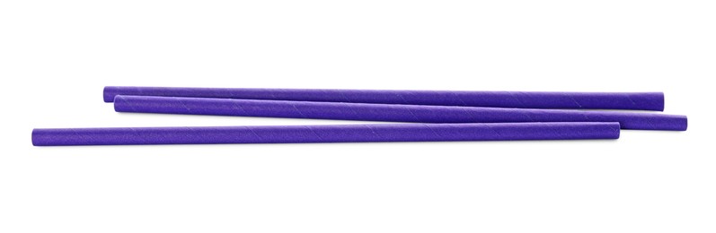 Photo of Purple paper cocktail straws on white background