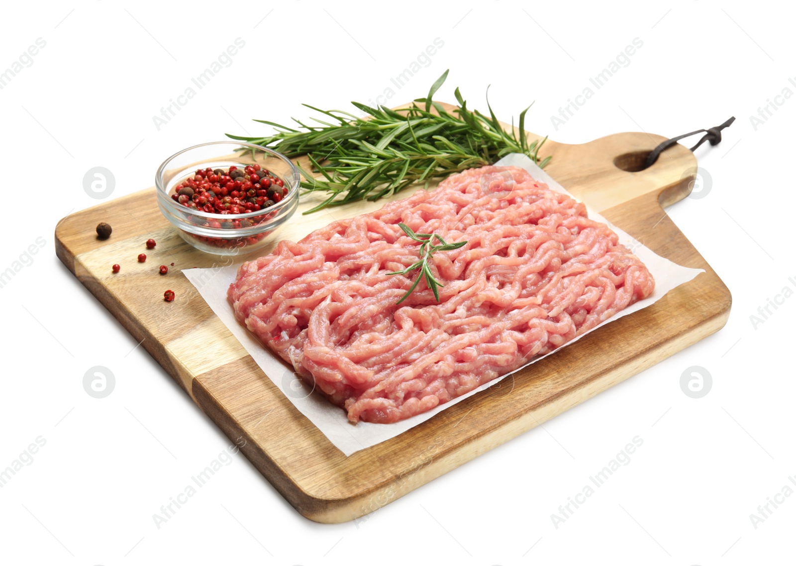 Photo of Raw chicken minced meat with spices and rosemary on white background