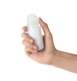 Photo of Woman holding roll-on deodorant on white background, closeup