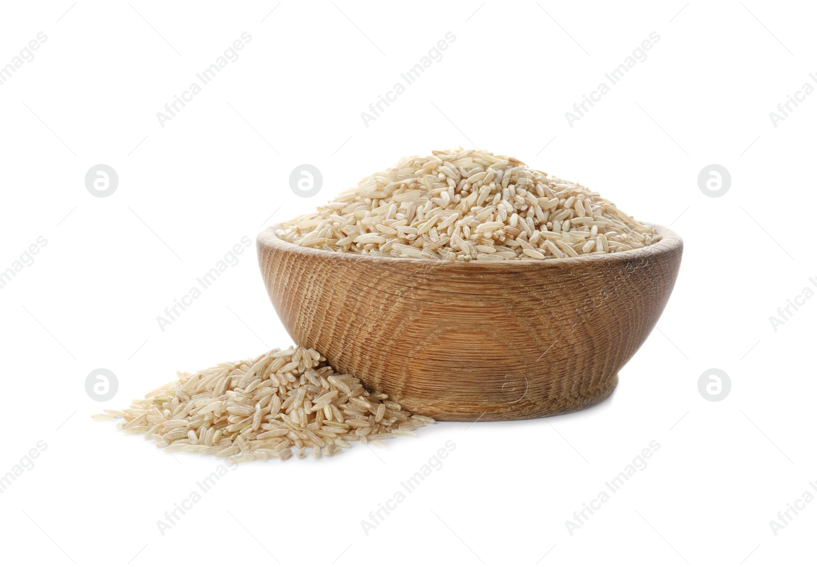 Photo of Wooden bowl with brown rice on white background