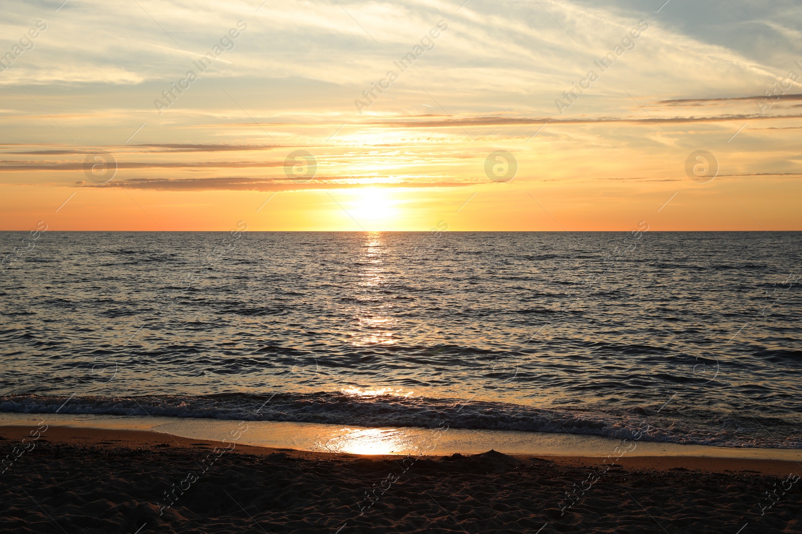 Photo of Picturesque view of sea at sunset. Tropical beach