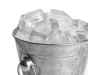 Metal bucket with ice cubes isolated on white