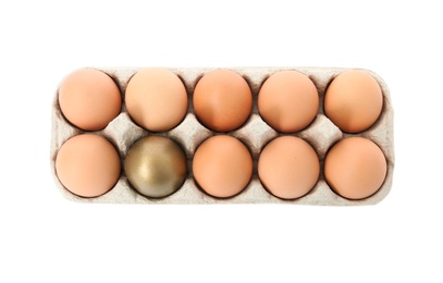 Photo of One golden egg among others in carton on white background , top view