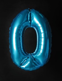 Blue number zero balloon on black background