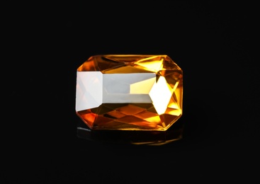 Photo of Beautiful gemstone for jewelry on black background