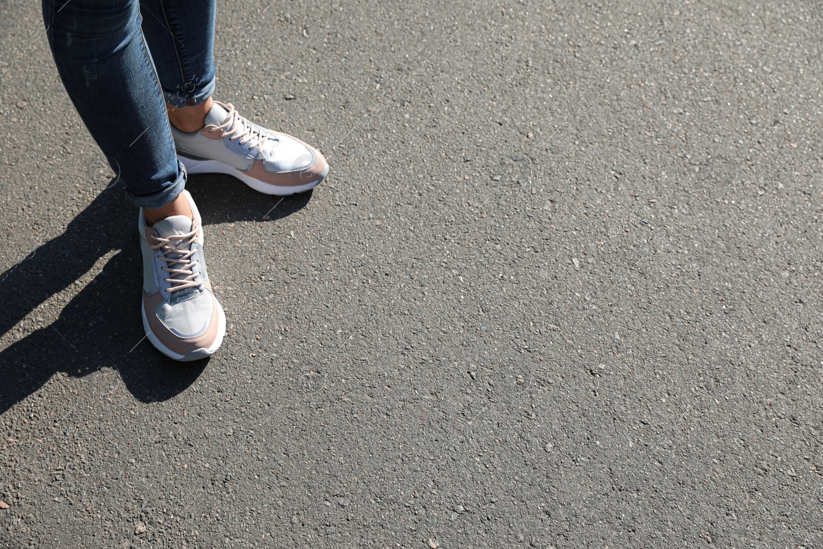 Photo of Woman standing outdoors, closeup with space for text. Choosing way concept.