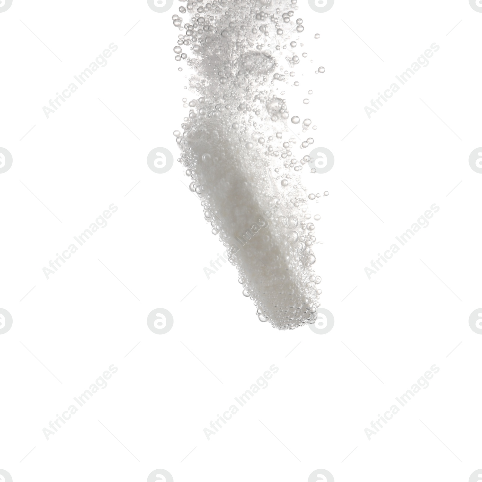 Photo of Effervescent pill dissolving in water on white background, closeup