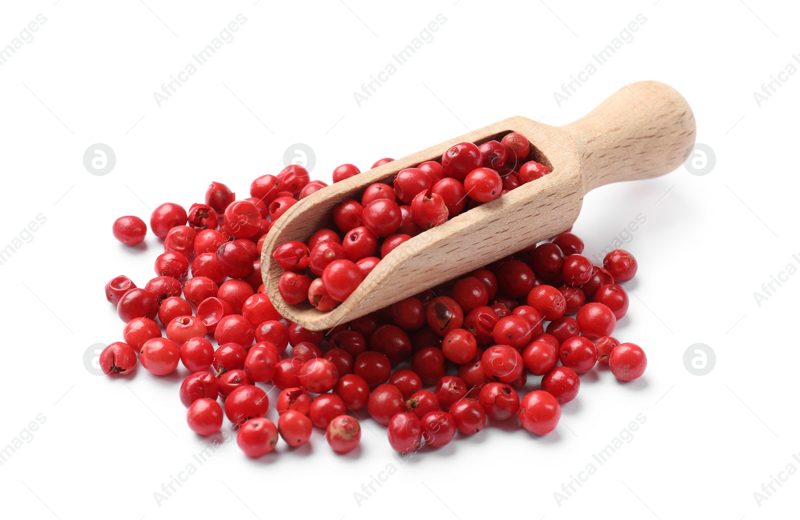 Photo of Aromatic spice. Red pepper in scoop isolated on white