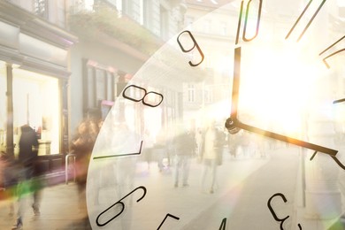 Image of Time related concepts. People walking in city and clock, blurred view. Double exposure