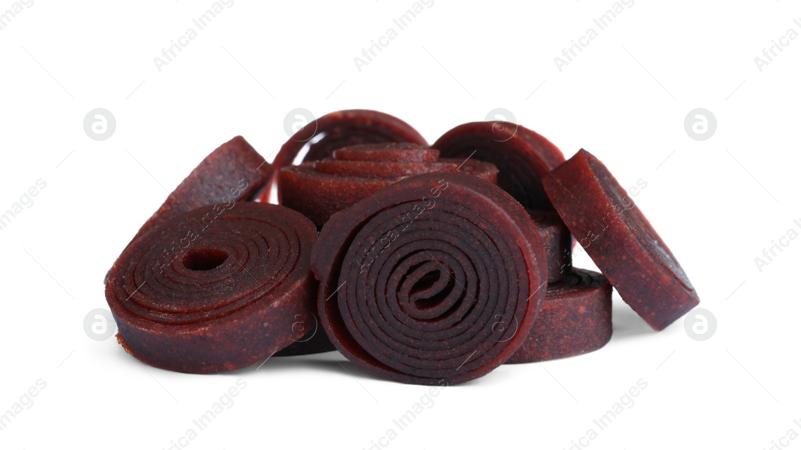 Photo of Delicious fruit leather rolls on white background