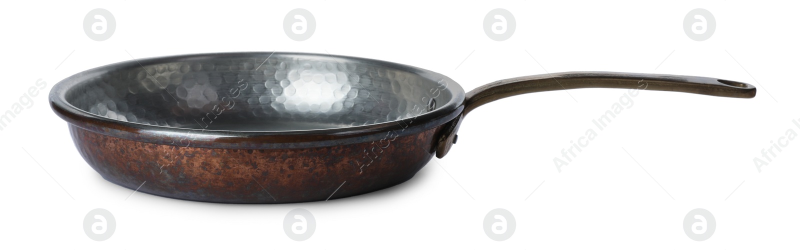 Photo of New metal frying pan isolated on white