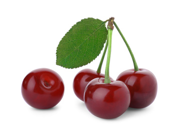 Photo of Sweet red juicy cherries isolated on white