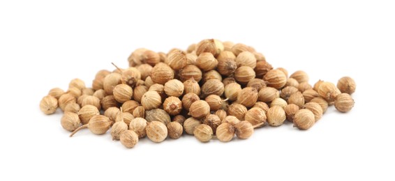 Photo of Heap of dried coriander seeds on white background