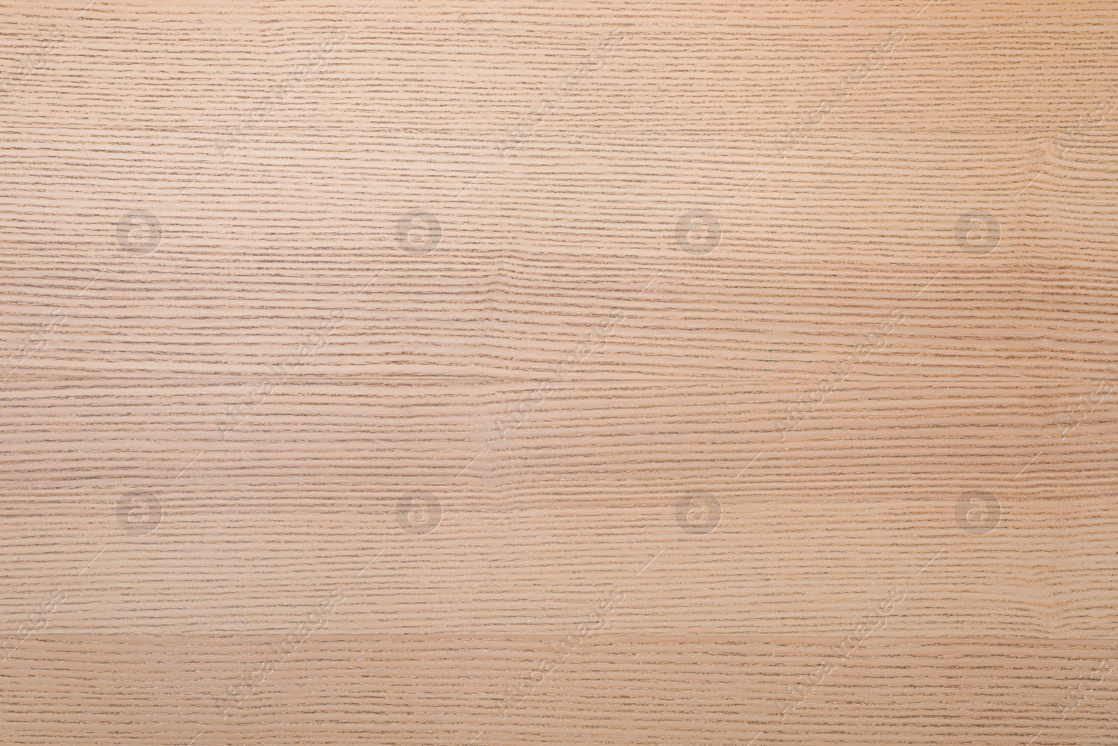 Photo of Texture of light wooden surface as background, top view