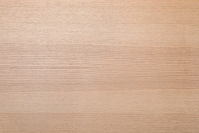 Photo of Texture of light wooden surface as background, top view