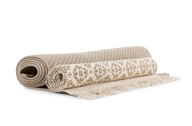 Photo of Different rolled carpets on white background. Interior element