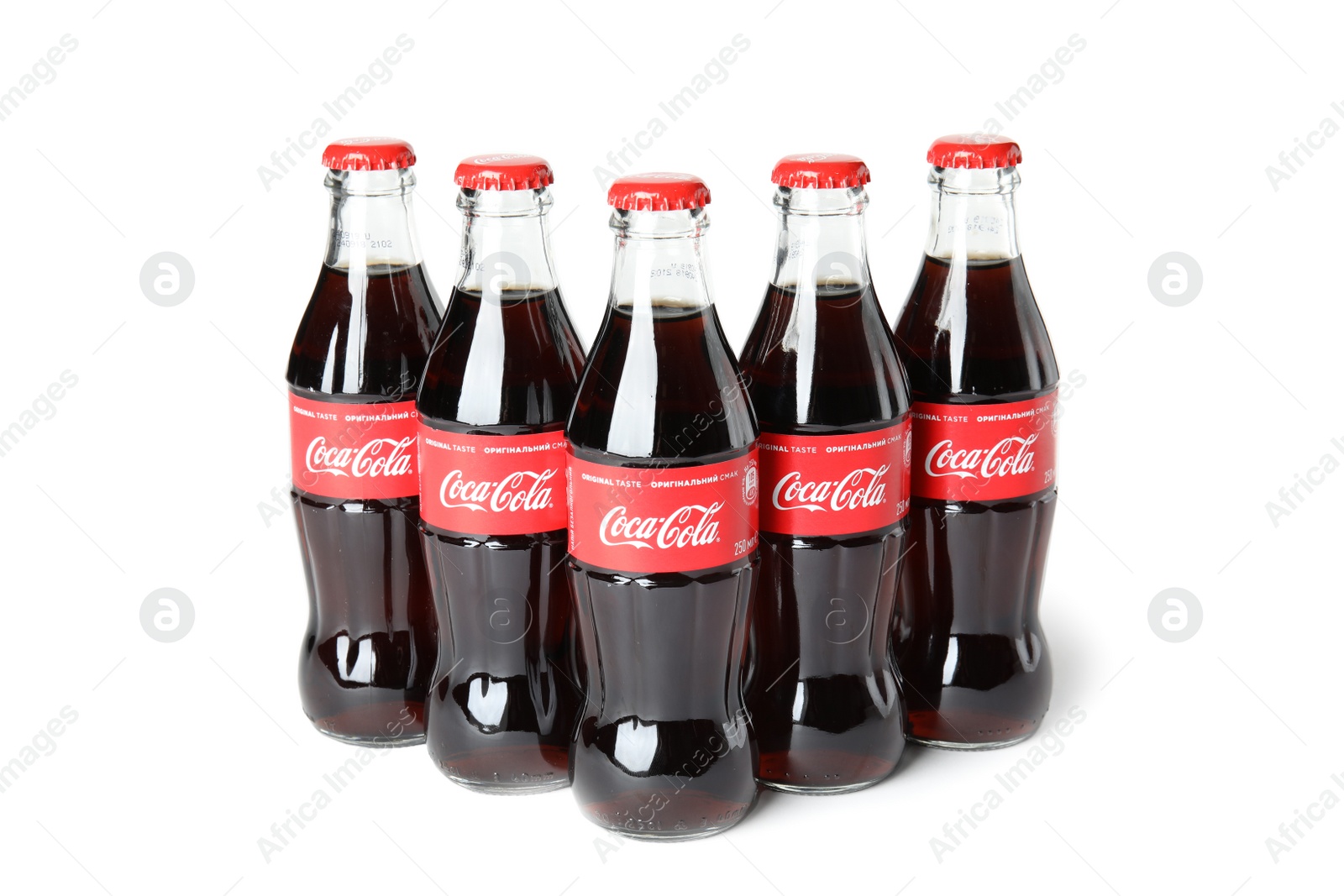 Photo of MYKOLAIV, UKRAINE - NOVEMBER 14, 2018: Bottles of Coca-Cola on white background